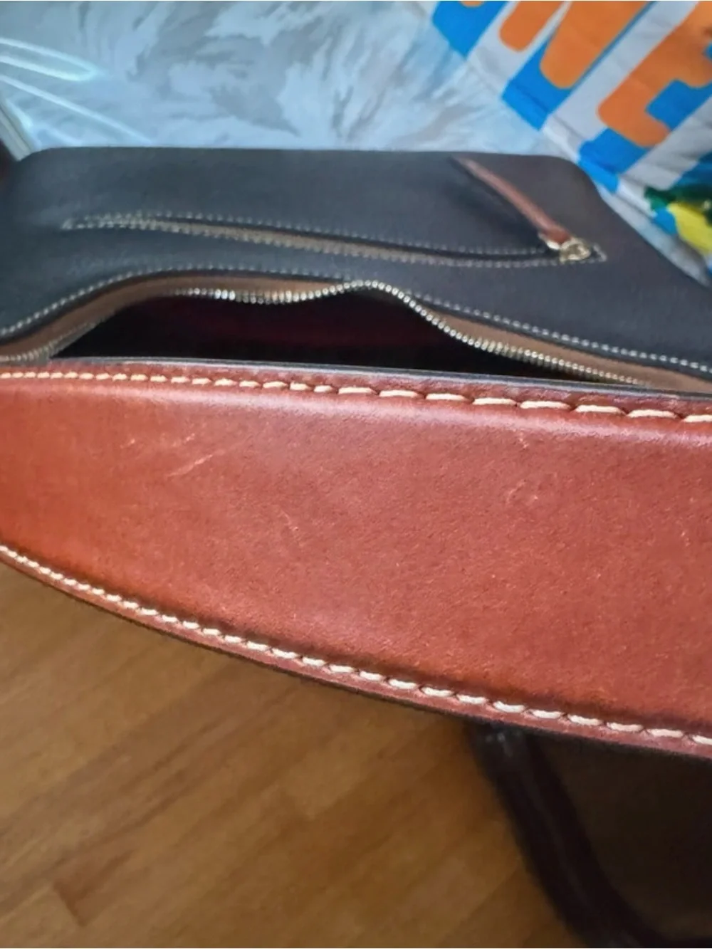 Dooney & Bourke Black Pebbled Leather Shoulder Bag with Brown Trim
